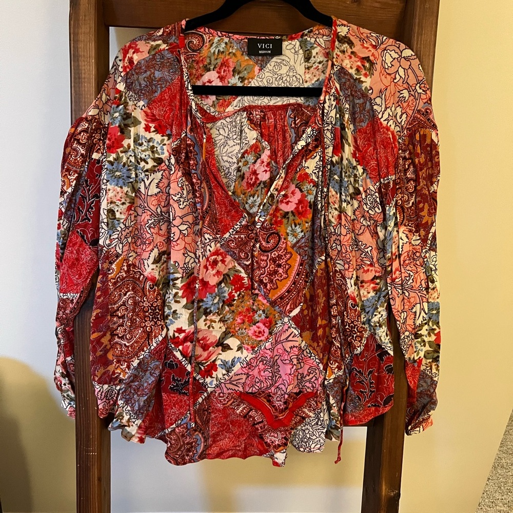 Women’s floral blouse size medium